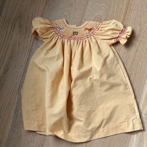 Adorable Yellow Smocked Baby Dress